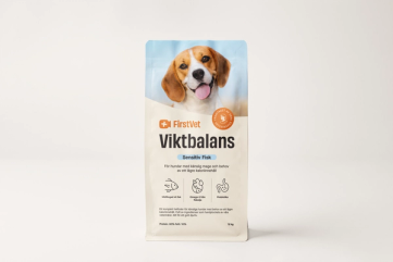 Förpackning med hundmat från märket FirstVet, med bild på en glad beagle på framsidan.